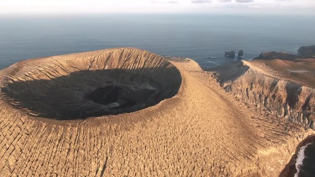 Aerial view of volcanic island, crater at sunrise - San Benedicto, Mexico