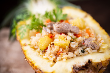 Fried rice with pork in half pineapple fruit, Thai cuisine