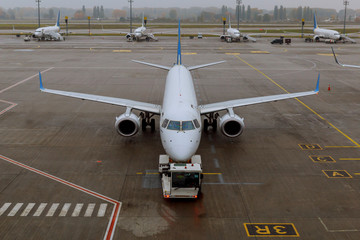 Planes undergo preflight service in the international airport