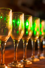 Closeup of wine glasses in a restaurant or banquet.