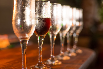 Closeup of wine glasses in a restaurant or banquet.