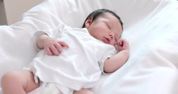 Asian new born baby sleeping