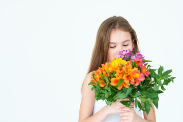 special flower bouquet delivery for someone you love. little girl holding a festive colorful floral arrangement of alstroemeria