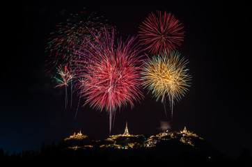 Fototapeta na wymiar Beautiful fireworks with Phra Nakhon Khiri ancient place (Khao Wang) landmark of Phetchaburi Province Thailand