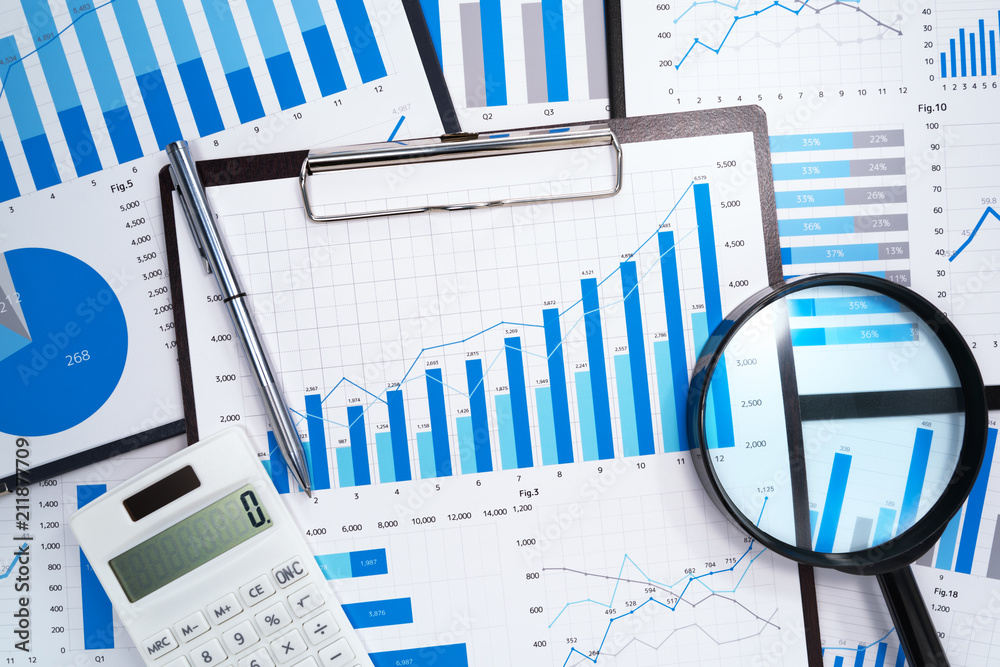 Poster data analysis. developing business growth strategy. many business reports. magnifying glass,calculat