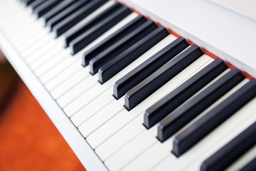 Fototapeta na wymiar Close up of black and white piano keys.