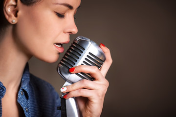 Beautiful woman singing.