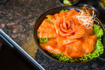 Raw salmons fillet on plate with wasabi in restaurant,Japanese food style