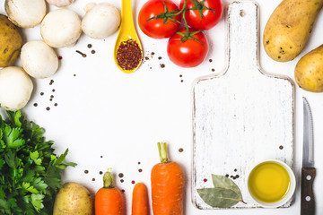 Food cooking background. Fresh vegetables, spices and mushrooms on  white background