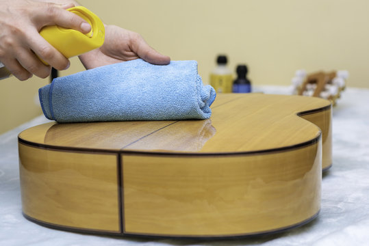 Cleaning spanish guitar.