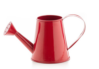 Red watering can on isolated on a white background

