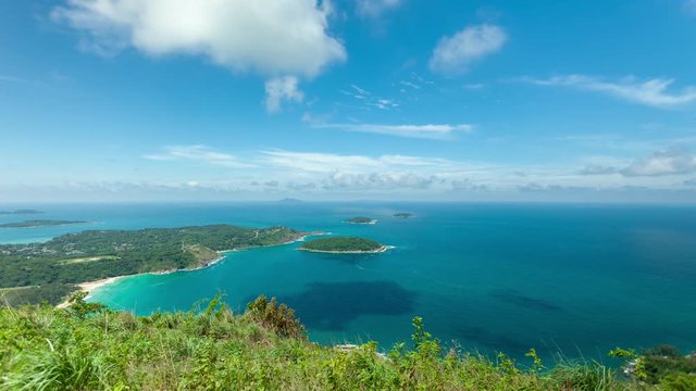 Timelapse of small island in tropical andaman sea,beautiful tropical island in Phuket. Thailand under a clear blue sunny sky in summer season