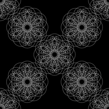 Flower mandala. Linear Graphics. Seamless pattern. Black background. Small items