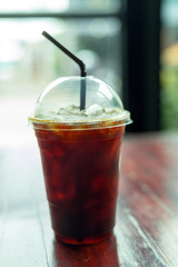 Back coffee on table wood.