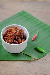 Thai chili paste on banana leaf background