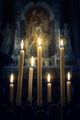 Seven candles in the Christian Church on the icon background. Abstract concept background on...
