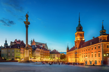 Fototapeta na wymiar Royal Castle, ancient townhouses and Sigismund's Column in Old town in Warsaw, Poland. Night view, long exposure.