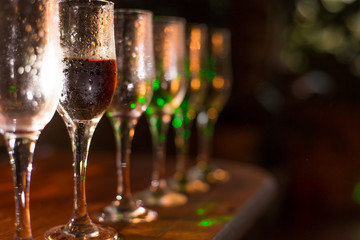 Glasses with wine on dark background. alcohol concept