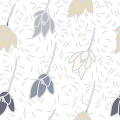 Tulips or crocuses vector seamless pattern. Floral modern background with stylized hand drawn flowers in pastel colors.