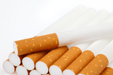 A cigarette filter for smoking on a white background.