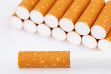 A cigarette filter for smoking on a white background.