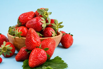juicy fresh strawberry on a delicately blue background