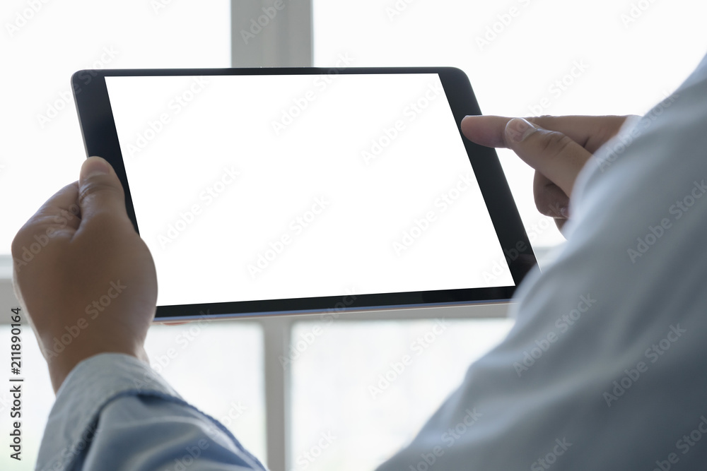 Poster digital tablet computer close up man using tablet hands man multitasking with isolated screen