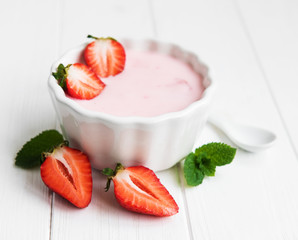 Bowl with strawberry yogurt