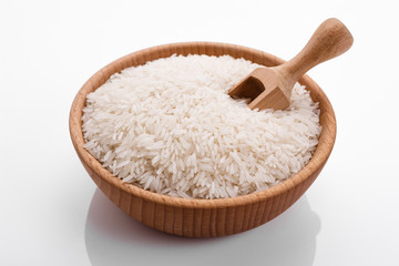 Fototapeta na wymiar Jasmine rice on a white acrylic background