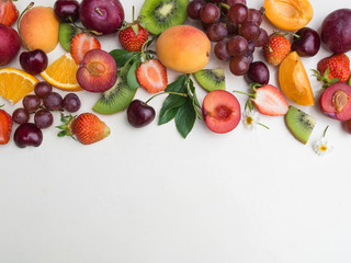 Various fruits background. Fruit border on white background. Copy space.