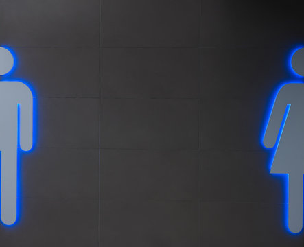 Water closet signs on wall