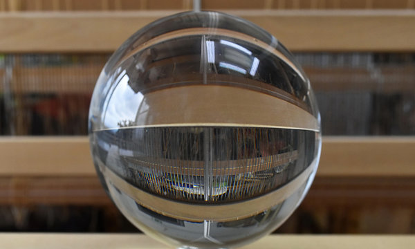 Weaving on a loom through the crystal ball