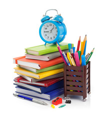 office and school supplies at white background