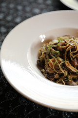 Spaghetti truffle cream sauce with mushroom