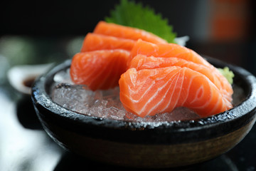 Salmon sashimi on ice Japanese food - obrazy, fototapety, plakaty
