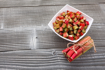 fresh rhubarb on a wooden rustic background