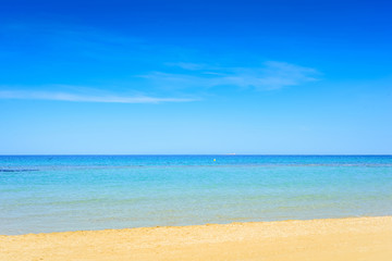 European sandy beach and blue sea.