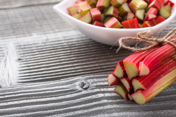 fresh rhubarb on a wooden rustic background