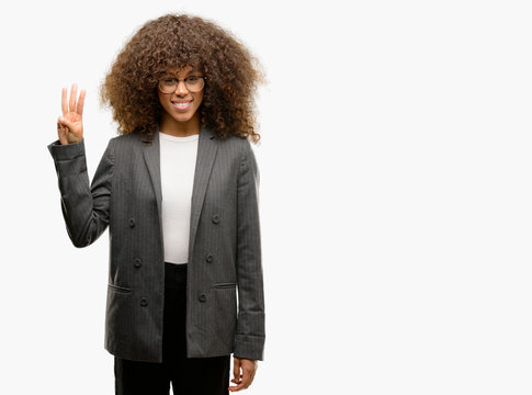 African american business woman wearing glasses showing and pointing up with fingers number three while smiling confident and happy.