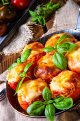 Tomatoes stuffed with rice and cheese from the oven