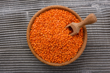 raw lentils on a wooden rustic background