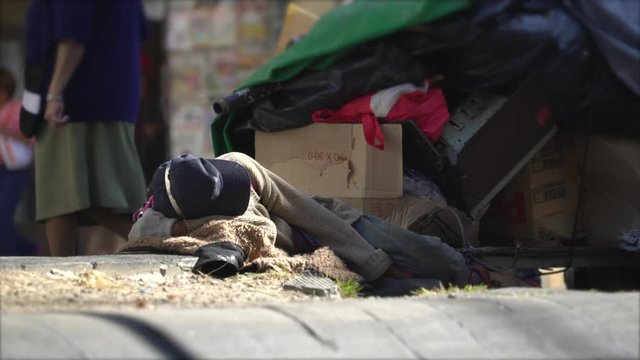 Homeless people lying on the street - Mexico City, Mexico