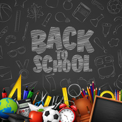 Back to School with school supplies and doodles on black chalkboard background