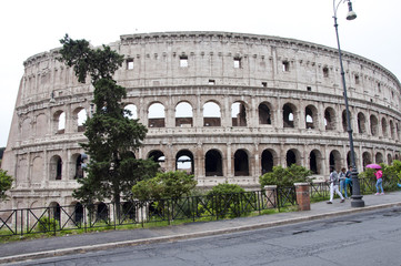 Fototapeta na wymiar Rome, Italy - May 01, 2018: amphithheater coliseum in rome, Italy. majestic amphithheater building in world. world traveling and europe vacation. amphithheater. huge amphithheater colosseum.