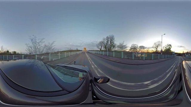 Driving over the Menai Bridge in North Wales towards Bangor - United Kingdom