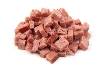 A portion of diced boiled sausage, ingredient for cooking, isolated on white background. Close-up.