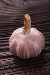 fragrant garlic on a wooden rustic background