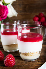 Raspberry dessert from whipped white chocolate mousse and raspbe