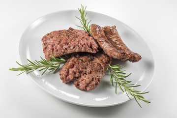 Dish with grilled sausages