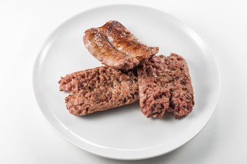 Dish with grilled sausages